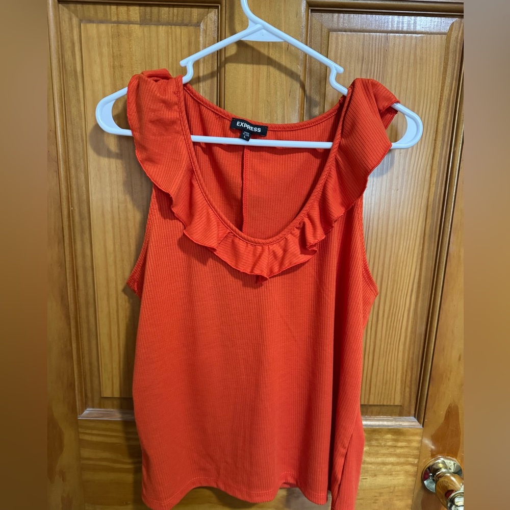 Express sleeveless top. Orange color. Size large